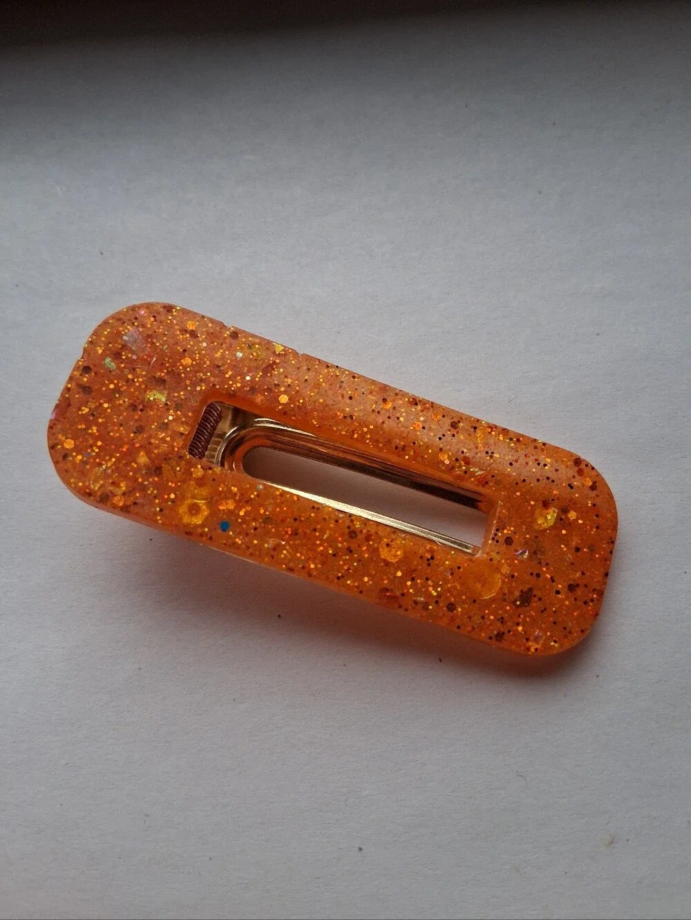 5/$25 Hand Crafted Orange Glitter Resin Hair Clip